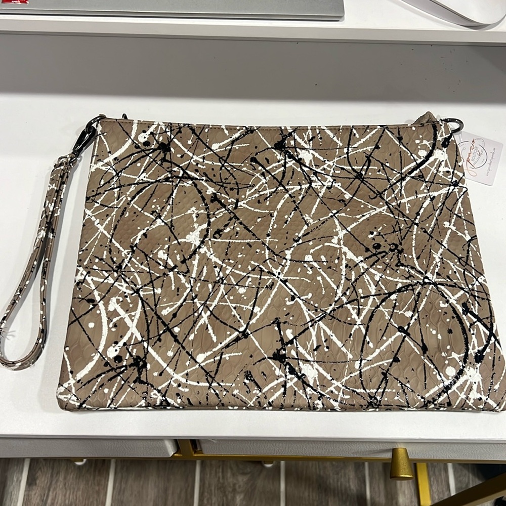 Large, chic clutch that doubles as a crossbody bag!
